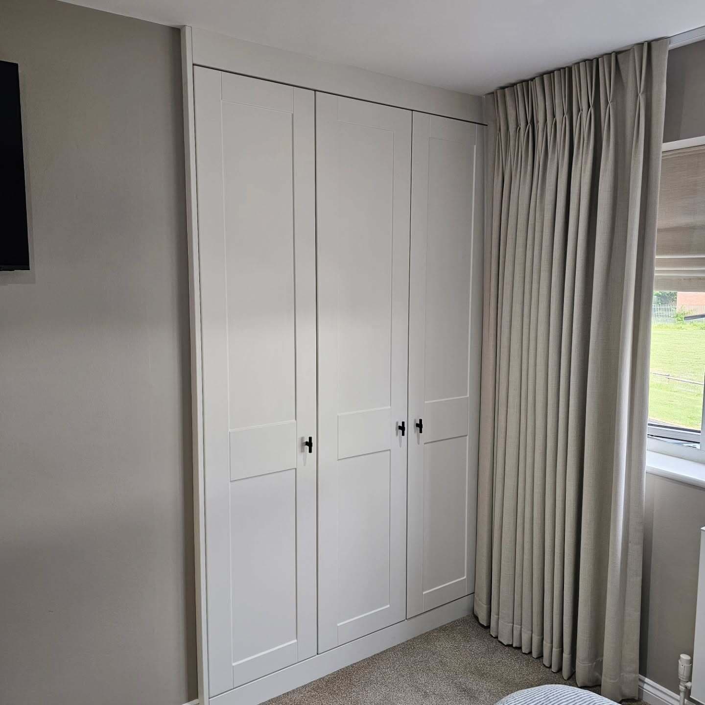 White bespoke fitted wardrobes
